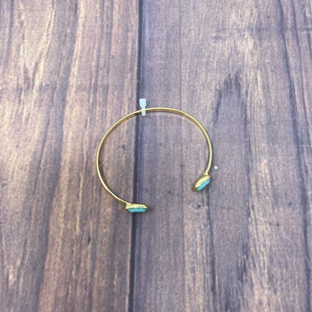 MACY’S GOLD BANGLE WITH TEAL STONE SY19